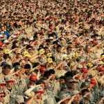Thousands of Boy Scouts render the Scout salute as they recite the Pledge of Allegiance during the  Boy Scout Jamboree, Sunday, July 31, 2005 at Fort AP Hill in Bowling Green, Va. (AP Photo/ Haraz N. Ghanbari)