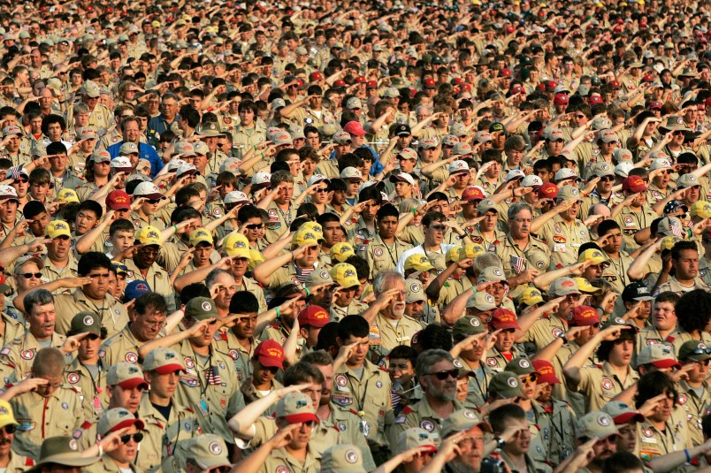 Thousands of Boy Scouts render the Scout salute as they recite the Pledge of Allegiance during the  Boy Scout Jamboree, Sunday, July 31, 2005 at Fort AP Hill in Bowling Green, Va. (AP Photo/ Haraz N. Ghanbari)