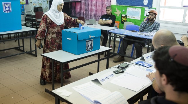 KAFIR QASIM, ISRAEL - APRIL 09:  An arab woman casts her ballot in Israel's general elections on April 9, 2019 in the village of Kafir Qasim, Israel.  (Photo by Amir Levy/Getty Images)