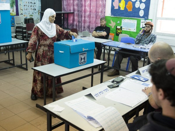 KAFIR QASIM, ISRAEL - APRIL 09:  An arab woman casts her ballot in Israel's general elections on April 9, 2019 in the village of Kafir Qasim, Israel.  (Photo by Amir Levy/Getty Images)