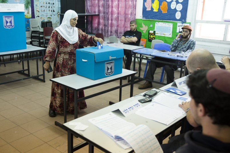 KAFIR QASIM, ISRAEL - APRIL 09:  An arab woman casts her ballot in Israel's general elections on April 9, 2019 in the village of Kafir Qasim, Israel.  (Photo by Amir Levy/Getty Images)