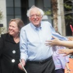 LOS ANGELES, CALIFORNIA - MARCH 23: 2020 Democratic presidential candidate U.S. Sen. Bernie Sanders (I-VT), C, arrives with his wife Jane at a campaign rally in Grand Park on March 23, 2019 in Los Angeles, California. Sanders, who is so far the top Democratic candidate in the race, is making the rounds in California which is considered a crucial 'first five' primary state by the Sanders campaign. California will hold on early primary on March 3, 2020. (Photo by Mario Tama/Getty Images)
