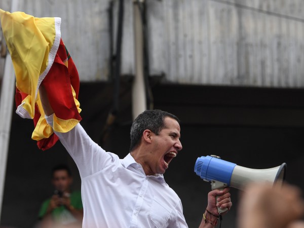 MARACAY, VENEZUELA - APRIL 26: Venezuelan opposition leader Juan Guaidó, waves a flag during a rally at  Plaza Bicentenario on April 26, 2019 in Maracay, Venezuela. On Wednesday 24th, the opposition-led National assembly presided by Guaidó took up a proposal to call for general elections within seven to nine months. (Photo by Carlos Becerra/Getty Images)