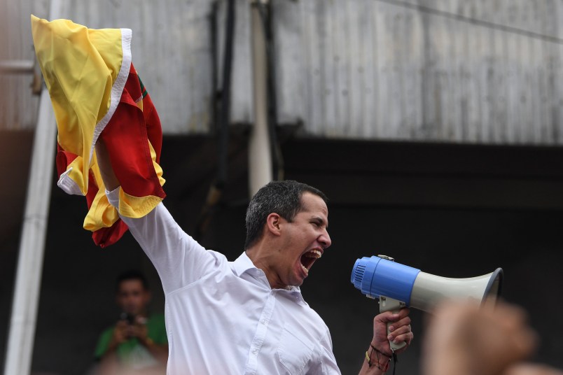MARACAY, VENEZUELA - APRIL 26: Venezuelan opposition leader Juan Guaidó, waves a flag during a rally at  Plaza Bicentenario on April 26, 2019 in Maracay, Venezuela. On Wednesday 24th, the opposition-led National assembly presided by Guaidó took up a proposal to call for general elections within seven to nine months. (Photo by Carlos Becerra/Getty Images)