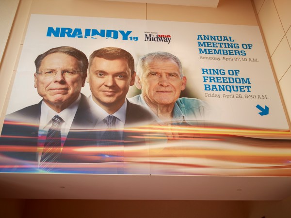 INDIANAPOLIS, INDIANA, UNITED STATES - 2019/04/27: A photo of Chief Executive and Executive Vice President Wayne LaPierre, chief lobbyist and principal political strategist for the Institute for Legislative Action Chris Cox and former NRA president Oliver North, is displayed on the Indiana Convention Center during the third day of the National Rifle Association convention. (Photo by Jeremy Hogan/SOPA Images/LightRocket via Getty Images)