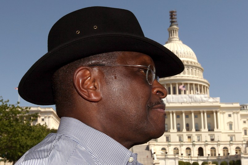 WASHINGTON, DC - APRIL 16:  Former Republican presidential candidate Herman Cain waits to speak at the "Cain's Revolution on the Hill" Tax Day Rally at the U.S. Capitol April 16, 2012 in Washington, DC. Cain spent the day promoting his 9-9-9 tax code plan in advance of tomorrow, the day that Americans are required to file their income taxes this year.  (Photo by Win McNamee/Getty Images)