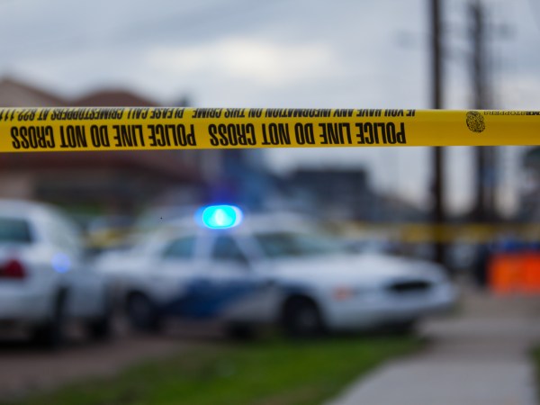 February 3, 2012, New Orleans, Louisiana, Police tape blocks of crime scene in the 7th Ward at the intersection of Annette and North Villere streets where a man was murdered by gunfire.