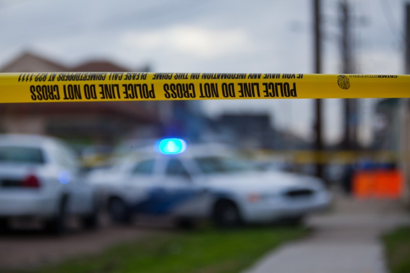 February 3, 2012, New Orleans, Louisiana, Police tape blocks of crime scene in the 7th Ward at the intersection of Annette and North Villere streets where a man was murdered by gunfire.