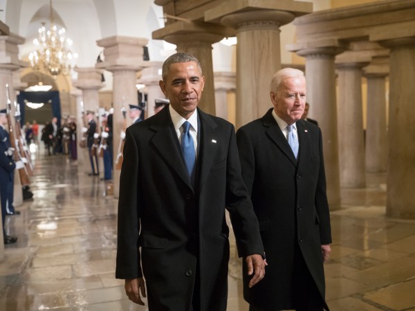 President Barack Obama and Vice President Joe Biden walk through the Crypt of the Capitol for Donald Trump’s inauguration ceremony, in Washington, Friday, Jan. 20, 2017. (AP Photo/J. Scott Applewhite, Pool)