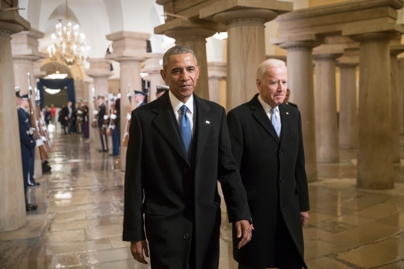 President Barack Obama and Vice President Joe Biden walk through the Crypt of the Capitol for Donald Trump’s inauguration ceremony, in Washington, Friday, Jan. 20, 2017. (AP Photo/J. Scott Applewhite, Pool)