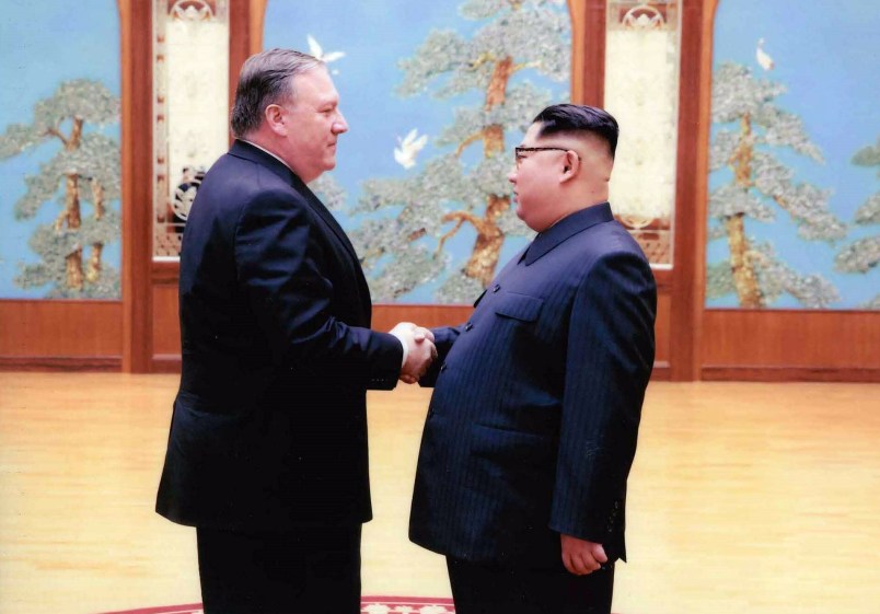 PYONGYANG, NORTH KOREA - APRIL 25: In this handout provided by The White House, CIA director Mike Pompeo shakes hands with North Korean leader Kim Jong Un in this undated image in Pyongyang, North Korea. Pompeo, now Secretary of State spoke with Kim for more than an hour during the Easter weekend. (Photo by The White House via Getty Images)