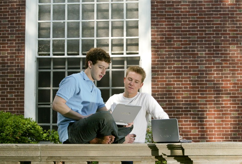 Mark Zuckerberg (L) and Chris Hughes (R)   creaters  "Facebook" photographed at  Eliot House at Harvard University, Cambridge, MA. on May 14, 2004.    Facebook was created in February 2004,  3 months prior to this photograph.