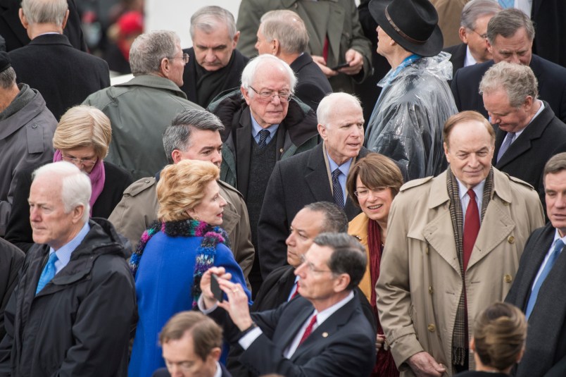 UNITED STATES - JANUARY 20: Senators including Bernie Sanders, I-Vt., center and John McCain, R-Ariz., are seen on the West Front of the Capitol before Donald J. Trump was sworn in as the 45th President of the United States, January 20, 2017. (Photo By Tom Williams/CQ Roll Call)