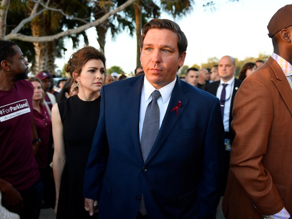 Florida Governor Ron DeSantis attends an interfaith service at Pine Trails Park in Parkland, Fla., to remember the 17 victims killed last year at Marjory Stoneman Douglas High School, on Thursday, Feb. 14, 2019. (Michael Laughlin/Sun Sentinel/TNS)