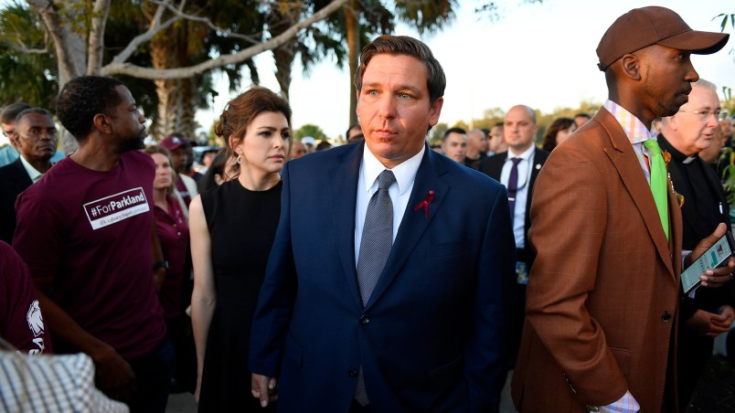 Florida Governor Ron DeSantis attends an interfaith service at Pine Trails Park in Parkland, Fla., to remember the 17 victims killed last year at Marjory Stoneman Douglas High School, on Thursday, Feb. 14, 2019. (Michael Laughlin/Sun Sentinel/TNS)