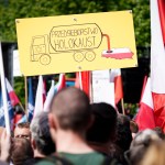 A sign is seen during the protest against the JUST act in Warsaw, Poland on May 11, 2019. Several thousand people gathered in front of the Prime Minister's office and marched to the US embassy to protest the Justice for Uncompensated Survivors Today (JUST) act 447 which requires the US State Department to report on progress made by 47 countries on compensation of assests seized during WWII for Holocaust survivors. Poland is the only European country that has not yet passed any laws to regulate compensation for rightful owners of seized properties. (Photo by Jaap Arriens/NurPhoto)