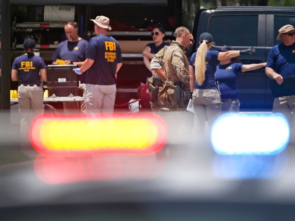 DALLAS, TX - JUNE 17: FBI agents gather near the Earle Cabell Federal Building on June 17, 2019 in Dallas, Texas. The shooter, identified as 22 year-old Brian Isaack Clyde, was shot dead after opening fire on the courthouse. No one else was injured in the shooting. (Photo by Ron Jenkins/Getty Images)
