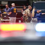 DALLAS, TX - JUNE 17: FBI agents gather near the Earle Cabell Federal Building on June 17, 2019 in Dallas, Texas. The shooter, identified as 22 year-old Brian Isaack Clyde, was shot dead after opening fire on the courthouse. No one else was injured in the shooting. (Photo by Ron Jenkins/Getty Images)