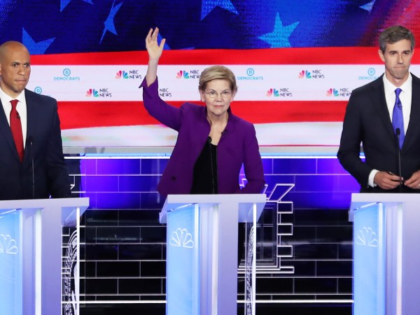 MIAMI, FLORIDA - JUNE 26: (L-R) Sen. Cory Booker (D-NJ), Sen. Elizabeth Warren (D-MA) and former Texas congressman Beto O'Rourke take part in the first night of the Democratic presidential debate on June 26, 2019 in Miami, Florida.  A field of 20 Democratic presidential candidates was split into two groups of 10 for the first debate of the 2020 election, taking place over two nights at Knight Concert Hall of the Adrienne Arsht Center for the Performing Arts of Miami-Dade County, hosted by NBC News, MSNBC, and Telemundo. (Photo by Joe Raedle/Getty Images)
