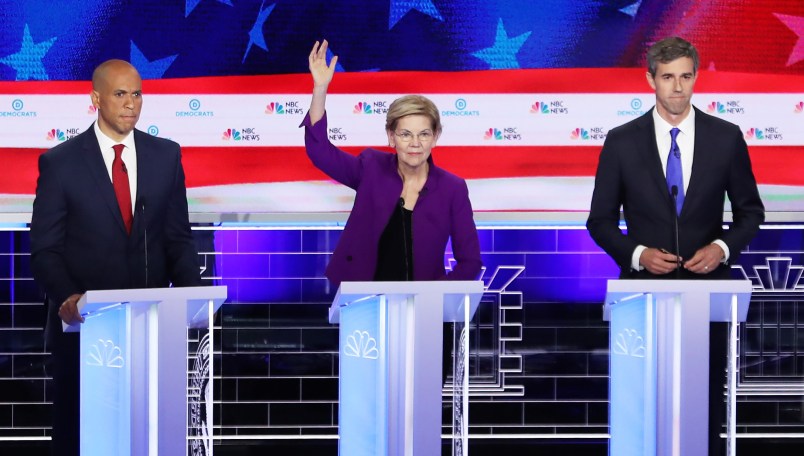 MIAMI, FLORIDA - JUNE 26: (L-R) Sen. Cory Booker (D-NJ), Sen. Elizabeth Warren (D-MA) and former Texas congressman Beto O'Rourke take part in the first night of the Democratic presidential debate on June 26, 2019 in Miami, Florida.  A field of 20 Democratic presidential candidates was split into two groups of 10 for the first debate of the 2020 election, taking place over two nights at Knight Concert Hall of the Adrienne Arsht Center for the Performing Arts of Miami-Dade County, hosted by NBC News, MSNBC, and Telemundo. (Photo by Joe Raedle/Getty Images)