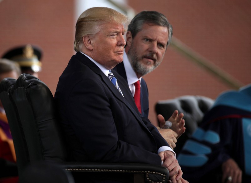LYNCHBURG, VA - MAY 13:  U.S. President Donald Trump (L) and Jerry Falwell (R), President of Liberty University, on stage during a commencement at Liberty University May 13, 2017 in Lynchburg, Virginia. President Trump is the first sitting president to speak at LibertyÕs commencement since George H.W. Bush spoke in 1990.  (Photo by Alex Wong/Getty Images)