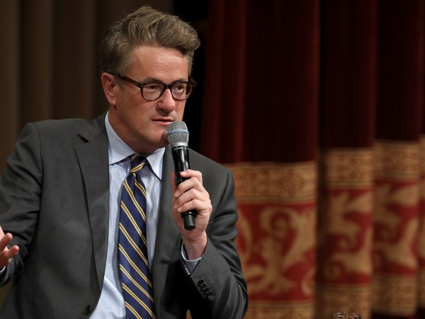 MSNBC 'Morning Joe' hosts Joe Scarborough and Mika Brzezinski are interviewed by philanthropist and financier David Rubenstein during a Harvard Kennedy School Institute of Politics event in the McGowan Theater at the National Archives July 12, 2017 in Washington, DC. Scarborough and Brzezinski, who are engaged to be married, were recently attacked by President Donald Trump on Twitter, where he called the hosts 'Psycho Joe' and 'low I.Q. Crazy Mika,' among other personal insults.