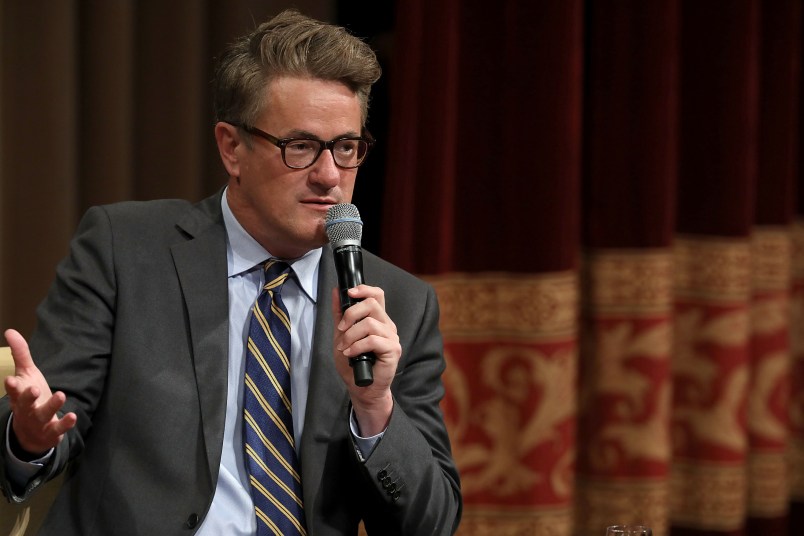 MSNBC 'Morning Joe' hosts Joe Scarborough and Mika Brzezinski are interviewed by philanthropist and financier David Rubenstein during a Harvard Kennedy School Institute of Politics event in the McGowan Theater at the National Archives July 12, 2017 in Washington, DC. Scarborough and Brzezinski, who are engaged to be married, were recently attacked by President Donald Trump on Twitter, where he called the hosts 'Psycho Joe' and 'low I.Q. Crazy Mika,' among other personal insults.