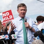 Democratic presidential candidate, Governor John Hickenlooper, makes a statement to media outside of the Homestead Detention Center on June 28, 2019 in Homestead, Fla. (Jennifer King/MIami Herald/TNS)