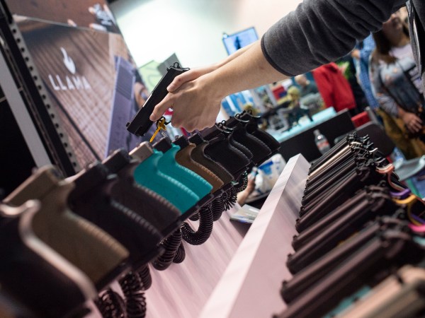 INDIANAPOLIS STATE HOUSE, INDIANAPOLIS, INDIANA, UNITED STATES - 2019/04/27: NRA members are seen checking out weapons and accessories during an exhibition.NRA members and leaders gather in Indianapolis, Indiana for the annual NRA Meeting where President Donald Trump and others spoke and attendees were able to view a multitude of exhibits featuring firearms, outdoors equipment, and shooting gear. (Photo by Matthew Hatcher/SOPA Images/LightRocket via Getty Images)