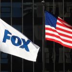 NEW YORK, NY - APRIL 24: A flag with the new logo for FOX flies outside of their corporate headquarters on 6th Avenue on April 24, 2019 in New York City. (Photo by Gary Hershorn/Getty Images)