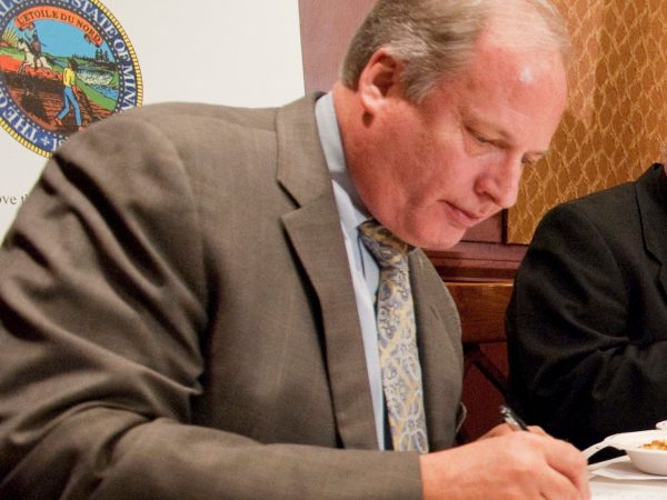UNITED STATES - MARCH 07:  Rep. Michele Bachmann, R-Minn., and Sen. Amy Klobuchar, D-Minn., right, check on judges former Rep. Vin Weber, R-Minn., left, and House Chaplain Patrick Conroy during the second annual "hotdish" competition in the Capitol Visitor Center, featuring casserole-like dishes from members of the Minnesota Congressional Delegation.  The dishes of Sen. Al Franken, D-Minn., and Rep. Chip Cravaack, R-Minn., tied for first place in the competition.  (Photo By Tom Williams/CQ Roll Call)