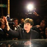 Former Gov. Rod Blagojevich waves to the crowd in front of his home as he leaves for prison, Thursday, March 15, 2012 in Chicago. Blagojevich is resentencing today. (William DeShazer/Chicago Tribune/TNS)