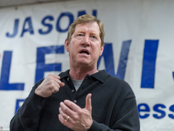 UNITED STATES - OCTOBER 28: Jason Lewis, Republican candidate  for Minnesota's 2nd Congressional District, talks with volunteers at his campaign office in Burnsville, MN, October 29, 2016. (Photo By Tom Williams/CQ Roll Call)