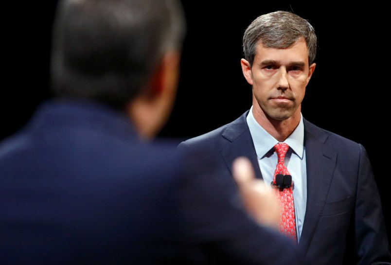 Rep. Beto O'Rourke (D-TX) looks and listens to Sen. Ted Cruz (R-TX) during a debate at McFarlin Auditorium at SMU in Dallas, on  Friday, September 21, 2018. (Tom Fox/The Dallas Morning News/Pool)