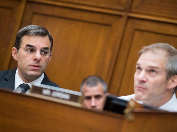 UNITED STATES - JUNE 12: Reps. Justin Amash, R-Mich., left, and ranking member Rep. Jim Jordan, R-Ohio, are seen during a House Oversight and Reform Committee markup in Rayburn Building on a resolution on whether to hold Attorney General William Barr and the Secretary of Commerce Wilbur Ross in contempt of Congress on Wednesday, June 12, 2019. (Photo By Tom Williams/CQ Roll Call)