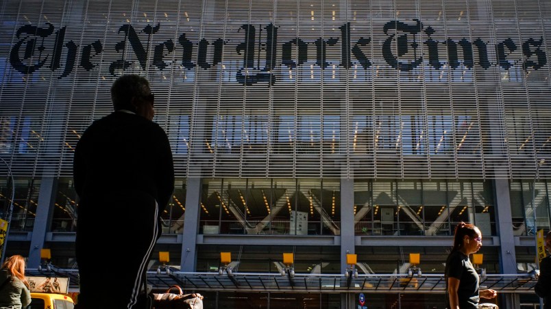 NEW YORK, USA - October 14: People walk along 8av as the New York Times building is seen at the background on October 14, 2019 in New York, USA. NY Times on Sunday evening, published a story titled, "Macabre Video of Fake Trump Shooting Media and Critics Is Shown at His Resort." The video showed the president as a mass shooter where he is executing media and his political opponents inside church. It was dysplayed at a pro Trump conference in Miami. NY Times is an American newspaper based in New York City with worldwide influence,  the paper has won 127 Pulitzer Prizes,  being ranked 18th in the world by circulation.(Photo by Eduardo MunozAlvarez/VIEWpress/Corbis via Getty Images)