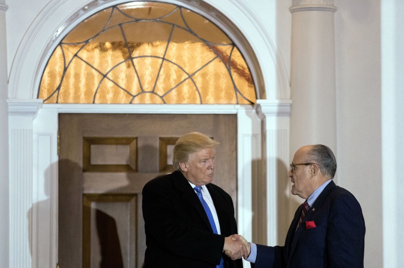 BEDMINSTER TOWNSHIP, NJ - NOVEMBER 20: (L to R) President-elect Donald Trump and former New York City mayor Rudy Giuliani shake hands following their meeting at Trump International Golf Club, November 20, 2016 in Bedminster Township, New Jersey. Trump and his transition team are in the process of filling cabinet and other high level positions for the new administration. (Photo by Drew Angerer/Getty Images)