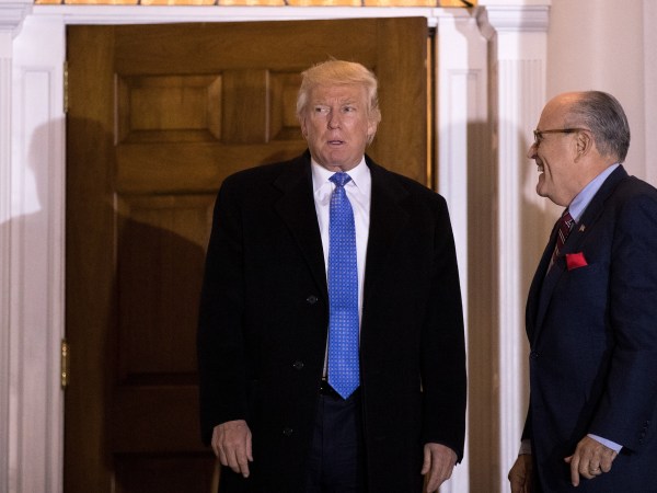 BEDMINSTER TOWNSHIP, NJ - NOVEMBER 20: (L to R) President-elect Donald Trump and former New York City mayor Rudy Giuliani exit the clubhouse following their meeting at Trump International Golf Club, November 20, 2016 in Bedminster Township, New Jersey. Trump and his transition team are in the process of filling cabinet and other high level positions for the new administration. (Photo by Drew Angerer/Getty Images)