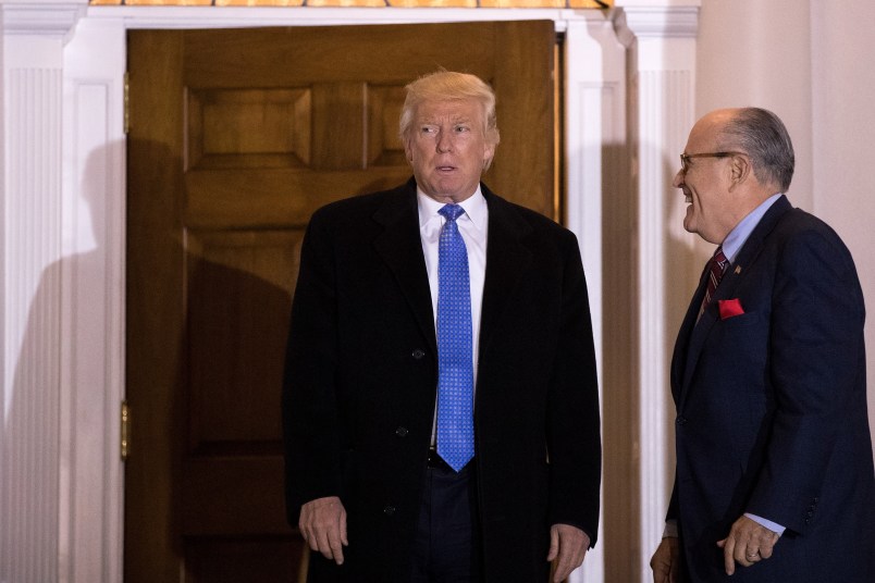 BEDMINSTER TOWNSHIP, NJ - NOVEMBER 20: (L to R) President-elect Donald Trump and former New York City mayor Rudy Giuliani exit the clubhouse following their meeting at Trump International Golf Club, November 20, 2016 in Bedminster Township, New Jersey. Trump and his transition team are in the process of filling cabinet and other high level positions for the new administration. (Photo by Drew Angerer/Getty Images)