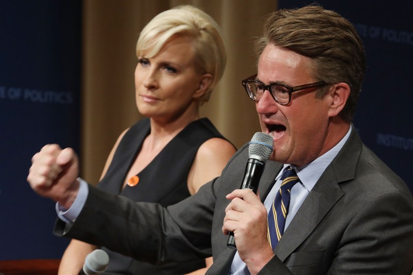MSNBC 'Morning Joe' hosts Joe Scarborough and Mika Brzezinski are interviewed by philanthropist and financier David Rubenstein during a Harvard Kennedy School Institute of Politics event in the McGowan Theater at the National Archives July 12, 2017 in Washington, DC. Scarborough and Brzezinski, who are engaged to be married, were recently attacked by President Donald Trump on Twitter, where he called the hosts 'Psycho Joe' and 'low I.Q. Crazy Mika,' among other personal insults.