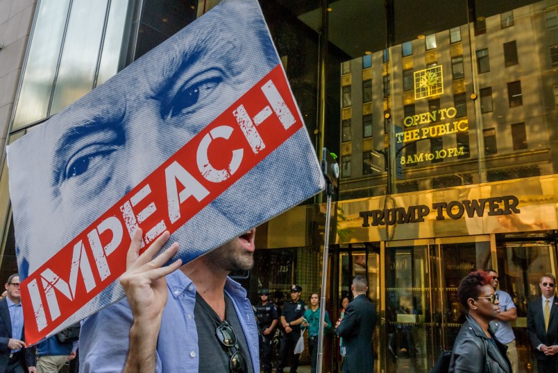 TRUMP TOWER, NEW YORK, UNITED STATES - 2018/06/07: Direct action group Rise and Resist demonstrated in front of Trump Tower, demanding the impeachment of Donald Trump. As he continues to try to discredit Mueller’s investigation, attack the press, and act in his self-interest rather than the interest of American citizens, Rise and Resist will press for impeachment through non-violent protest. (Photo by Erik McGregor/Pacific Press/LightRocket via Getty Images)