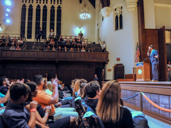 GAINESVILLE, FLORIDA, UNITED STATES - 2019/10/10: Donald Trump, Jr speaks to the students at the University of Florida.Donald Trump, Jr. and his girlfriend, Kimberly Guilfoyle, appeared at the University of Florida campus and spoke to a capacity crowd of about 850 students in what was billed as a “keynote presentation”. The couple was paid $50,000 from student activity fees and tickets were distributed free of charge to students. The event drew hundreds of protesters outside the University Auditorium who objected to what they called a campaign rally. Trump, Jr. and Guilfoyle spoke for less than a half hour each and answered a few questions submitted on Twitter. Several protesters were removed from the auditorium during the event. (Photo by Paul Hennessy/SOPA Images/LightRocket via Getty Images)