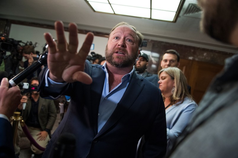 UNITED STATES - SEPTEMBER 05: Alex Jones of Inforwars, a news conference outside a Senate (Select) Intelligence Committee hearing in Dirksen Building where Sheryl Sandberg, Facebook COO, and Jack Dorsey, Twitter CEO, were testifying on the influence of foreign operations on social media on September 5, 2018. Jones has recently been banned from social media platforms. (Photo By Tom Williams/CQ Roll Call)