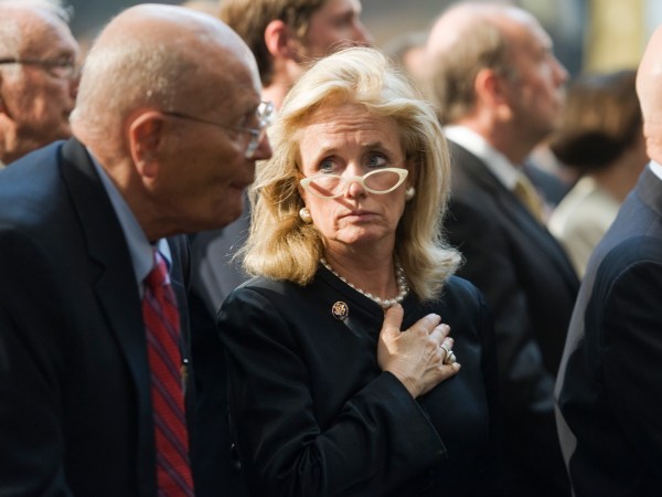 UNITED STATES - May 3:  Rep. John Dingell, D-Mich., and his wife Debbie Dingell attend the statue unveiling ceremony for President Gerald Ford in the rotunda of the Capitol.  (Photo By Tom Williams/Roll Call)
