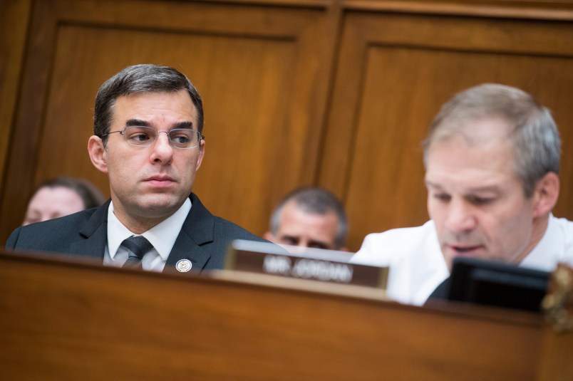 UNITED STATES - JUNE 12: Reps. Justin Amash, R-Mich., left, and ranking member Rep. Jim Jordan, R-Ohio, are seen during a House Oversight and Reform Committee markup in Rayburn Building on a resolution on whether to hold Attorney General William Barr and the Secretary of Commerce Wilbur Ross in contempt of Congress on Wednesday, June 12, 2019. (Photo By Tom Williams/CQ Roll Call)