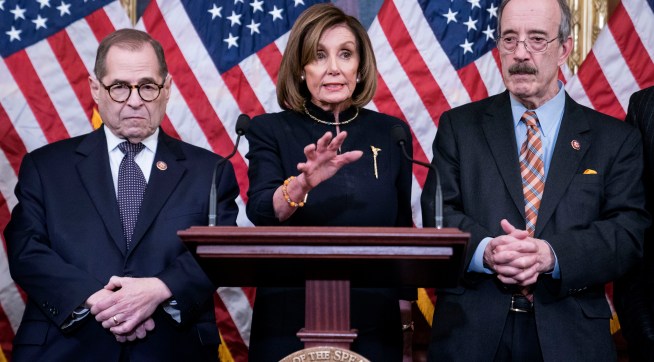 WASHINGTON, DC - DECEMBER 18: Speaker of the House Nancy Pelosi (D-CA) delivers remarks alongside Chairman Jerry Nadler, House Committee on the Judiciary (D-NY) and Chairman Eliot Engel, House Foreign Affairs Committee (D-NY), following the House of Representatives vote to impeach President Donald Trump on December 18, 2019 in Washington, DC. (Photo by Sarah Silbiger/Getty Images)