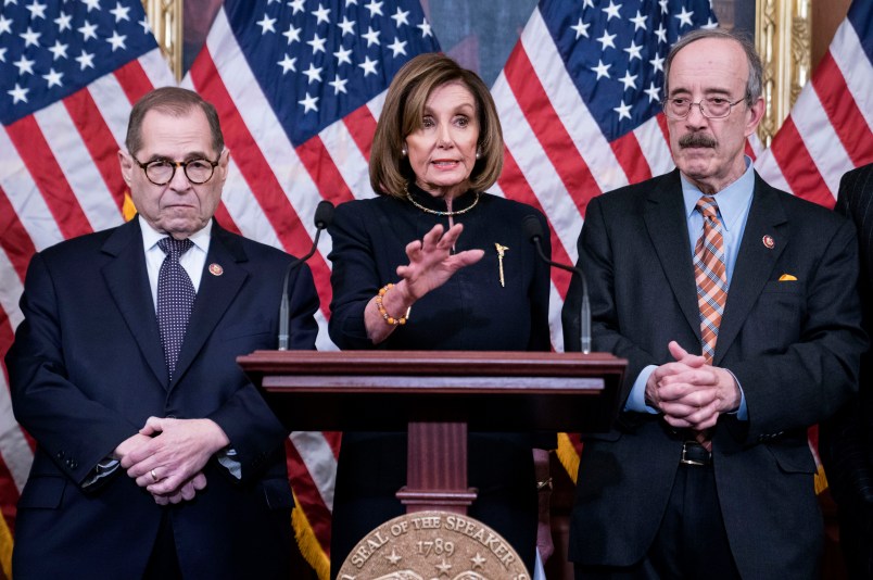 WASHINGTON, DC - DECEMBER 18: Speaker of the House Nancy Pelosi (D-CA) delivers remarks alongside Chairman Jerry Nadler, House Committee on the Judiciary (D-NY) and Chairman Eliot Engel, House Foreign Affairs Committee (D-NY), following the House of Representatives vote to impeach President Donald Trump on December 18, 2019 in Washington, DC. (Photo by Sarah Silbiger/Getty Images)