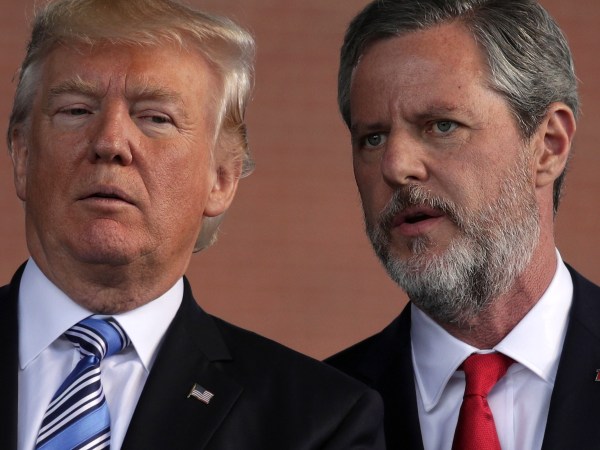 LYNCHBURG, VA - MAY 13:  U.S. President Donald Trump (L) and Jerry Falwell (R), President of Liberty University, on stage during a commencement at Liberty University May 13, 2017 in Lynchburg, Virginia. President Trump is the first sitting president to speak at LibertyÕs commencement since George H.W. Bush spoke in 1990.  (Photo by Alex Wong/Getty Images)
