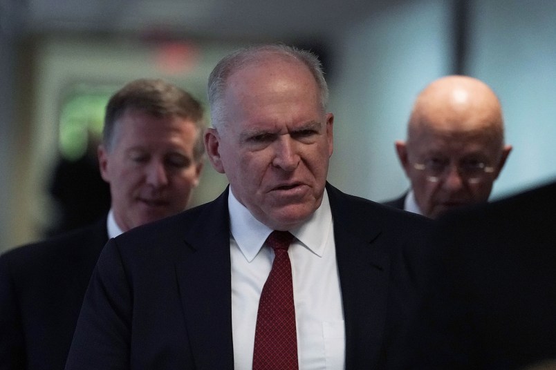 WASHINGTON, DC - MAY 16:  Former CIA director John Brennan (2nd L) and former director of National Intelligence James Clapper (R) arrive at a closed hearing before the Senate (Select) Intelligence Committee May 16, 2018 on Capitol Hill in Washington, DC. The committee held a hearing titled, "Evaluating the January 2017 Intelligence Community Assessment on 'Russian Activities and Intentions in Recent Elections.'"  (Photo by Alex Wong/Getty Images)