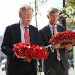 National Security Advisor of the United States John Bolton (L) and US Charge d'Affaires a.i. in Ukraine, Ambassador William Taylor lay wreaths of red carnations at the memorial wall which commemorates those who perished in fighting in Donbas in Mykhailivska Square, Kyiv, capital of Ukraine, August 27, 2019. Ukrinform.